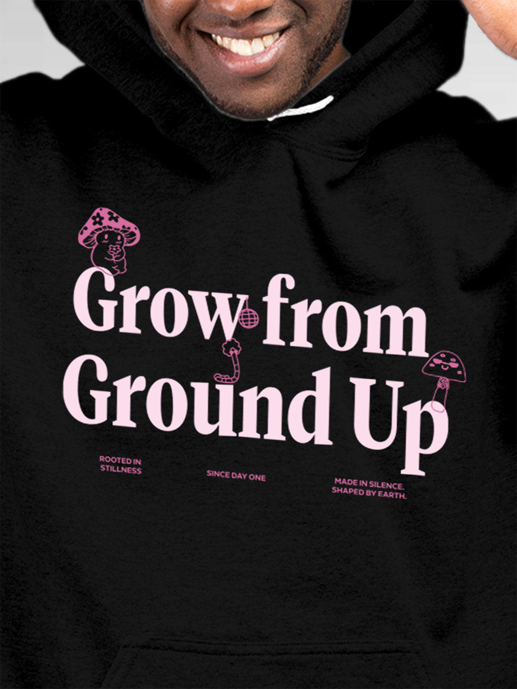 Close up of 'Grow From Ground Up' design on Men's Black Hoodie Sweatshirt, highlighting intricate details and vibrant print.