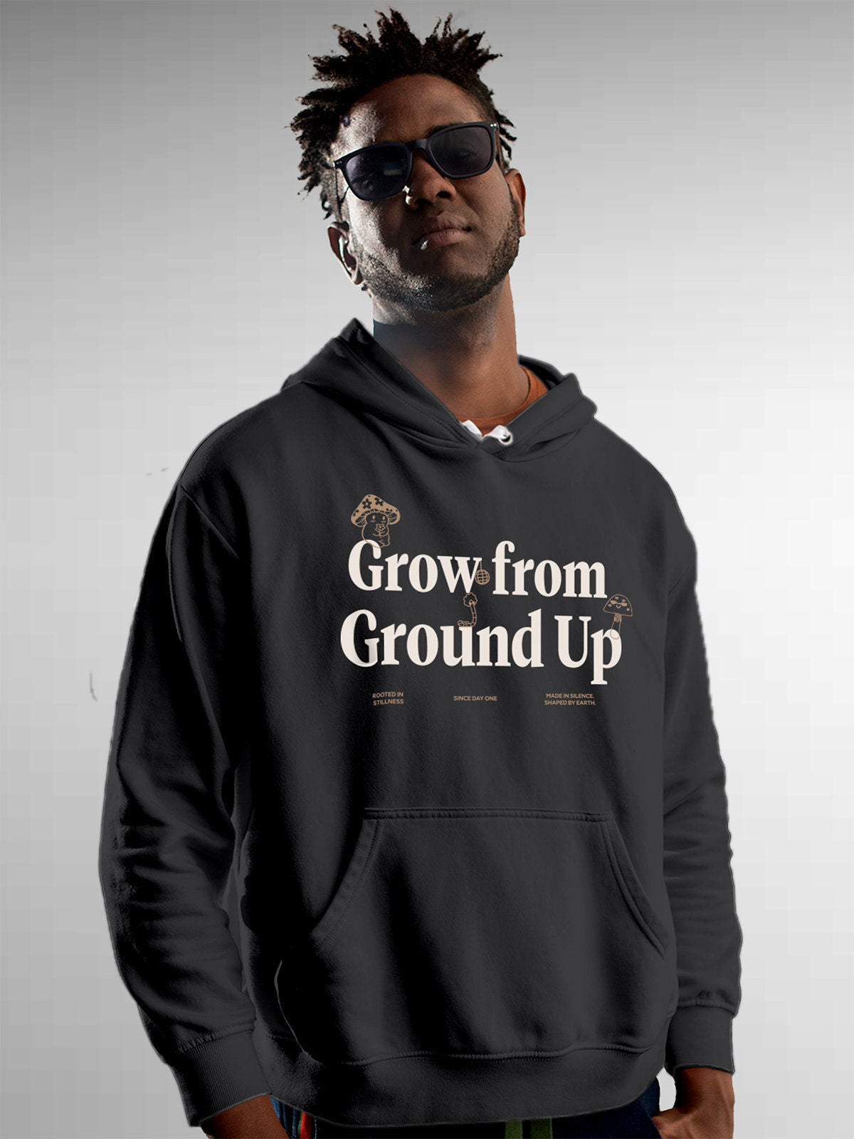 Model wearing Men's Dark Grey Hoodie Sweatshirt with 'Grow From Ground Up' design, offering effortless style and premium comfort