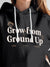 Close up of 'Grow From Ground Up' design on Women's Dark Grey Hoodie Sweatshirt, highlighting intricate details and vibrant print.
