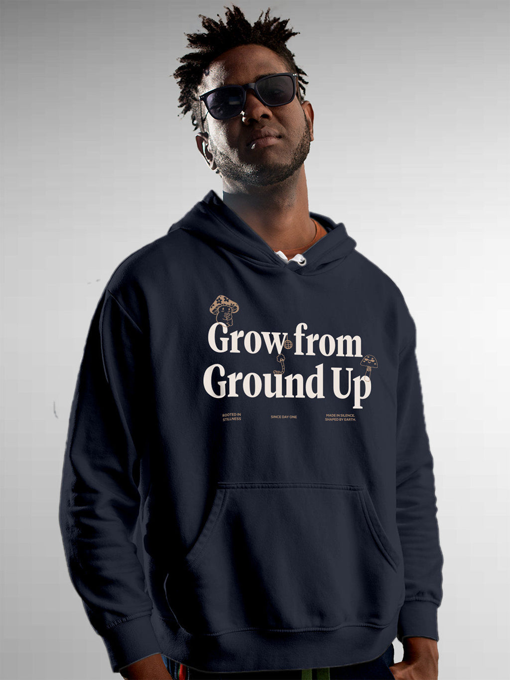 Model wearing Men's Navy Blue Hoodie Sweatshirt with 'Grow From Ground Up' design, offering effortless style and premium comfort