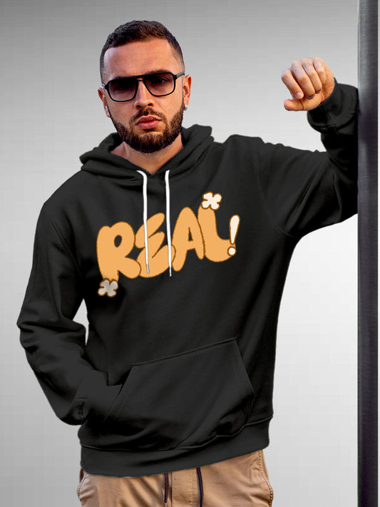 Model wearing Men's Dark Grey Hoodie Sweatshirt with 'Real' design, offering effortless style and premium comfort