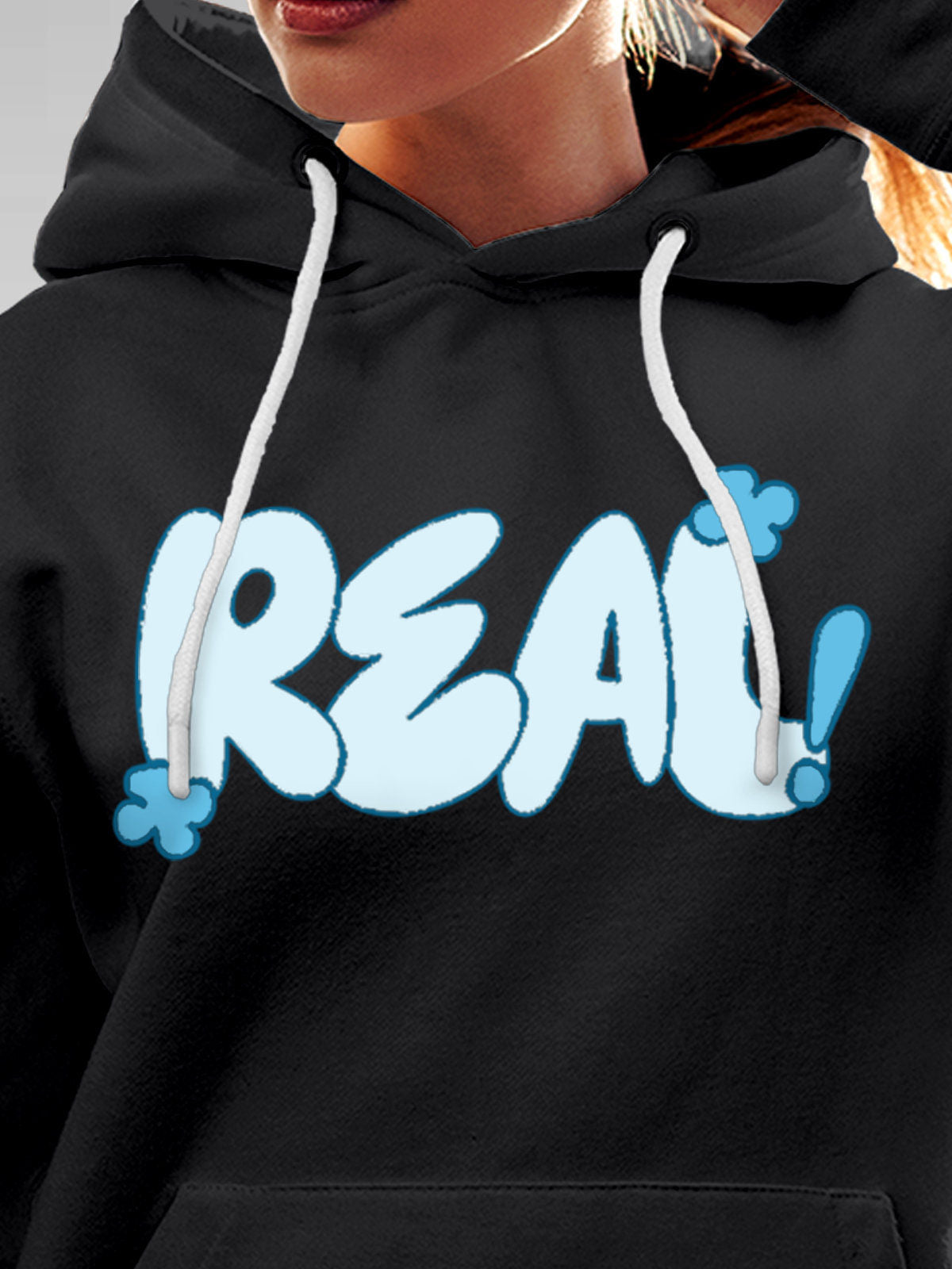 Close up of 'Real' design on Women's Dark Grey Hoodie Sweatshirt, highlighting intricate details and vibrant print.