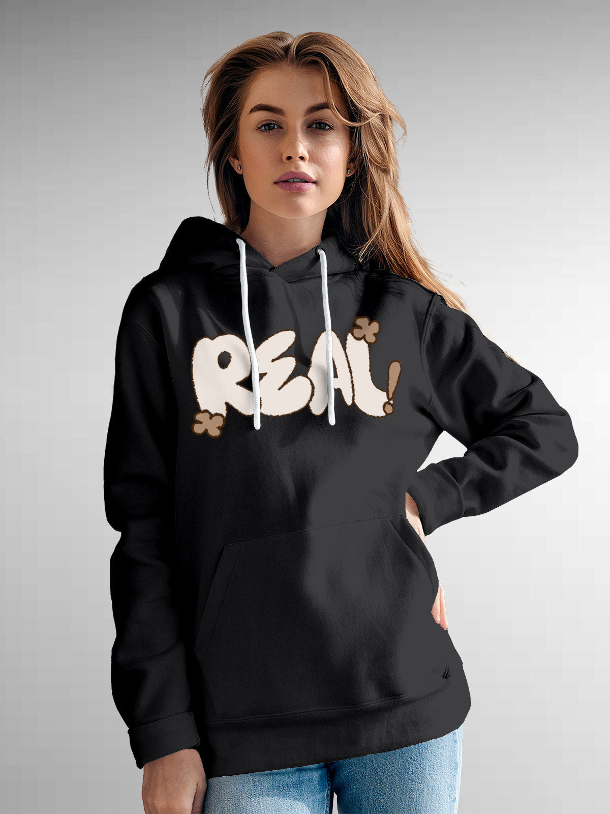 Model wearing Women's Dark Grey Hoodie Sweatshirt with 'Real' design, offering effortless style and premium comfort