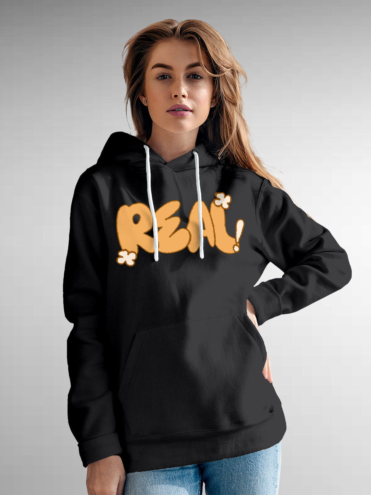 Model wearing Women's Dark Grey Hoodie Sweatshirt with 'Real' design, offering effortless style and premium comfort