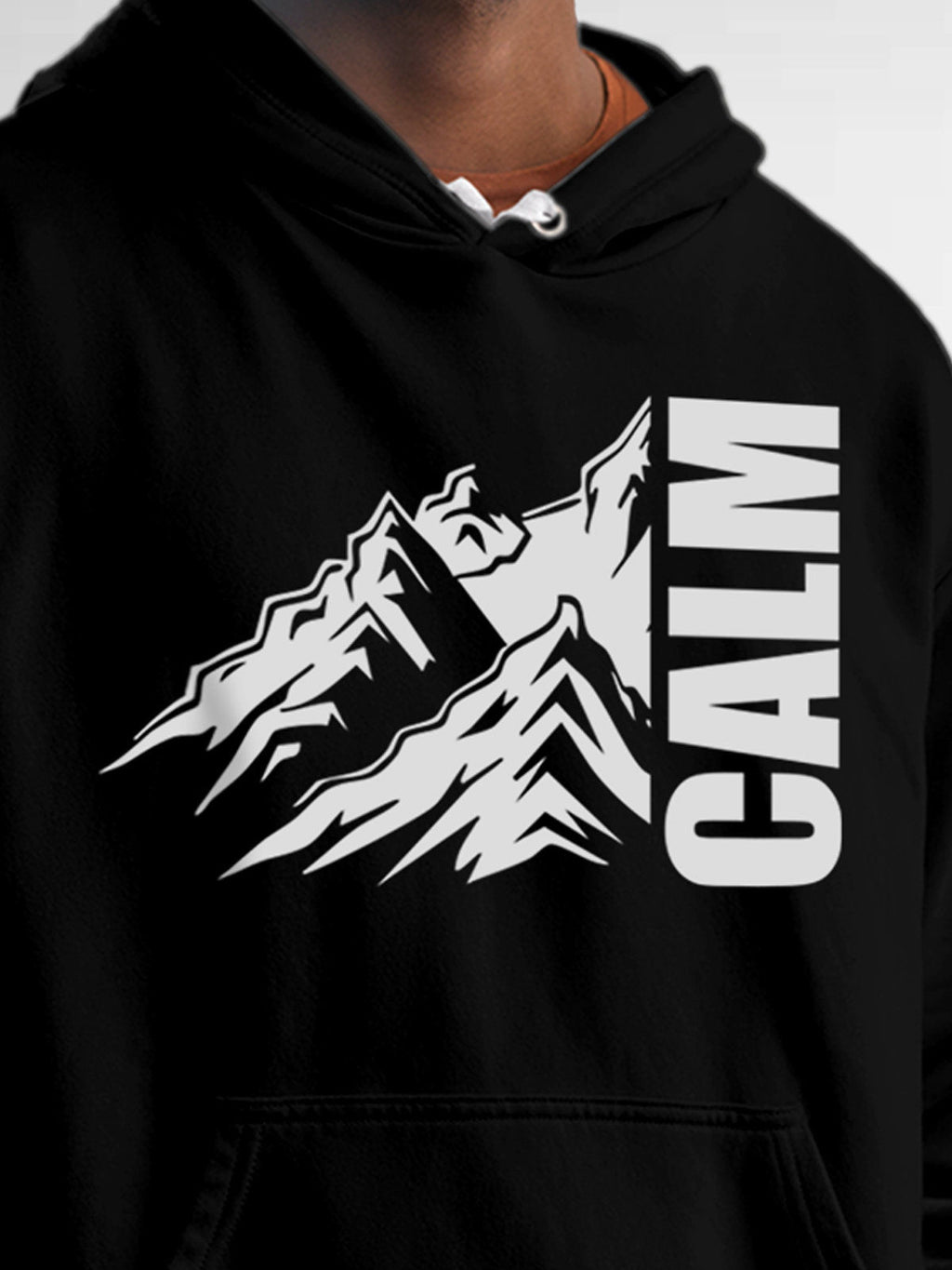 Close up of 'Calm' design on Men's Black Hoodie Sweatshirt, highlighting intricate details and vibrant print.