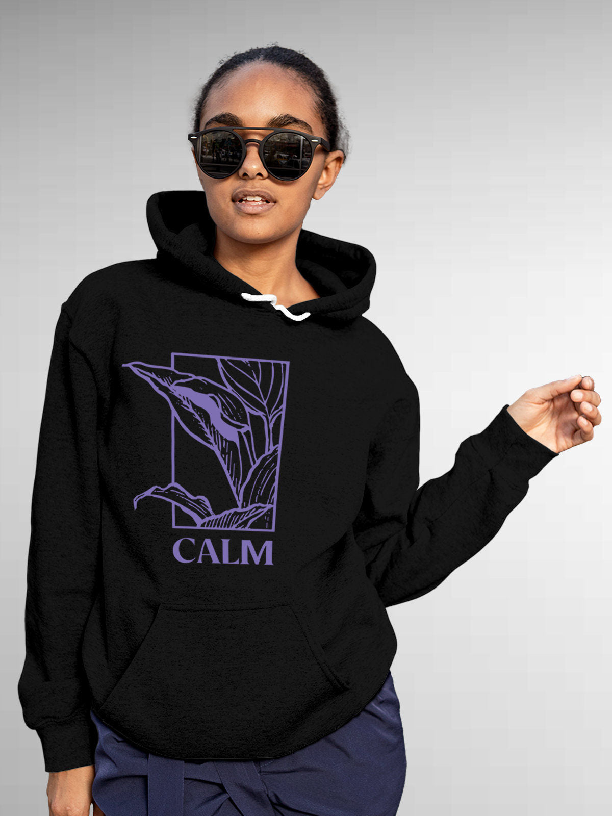 Model wearing Women's Black Hoodie Sweatshirt with 'Calm' design, offering effortless style and premium comfort