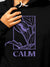 Close up of 'Calm' design on Women's Black Hoodie Sweatshirt, highlighting intricate details and vibrant print.