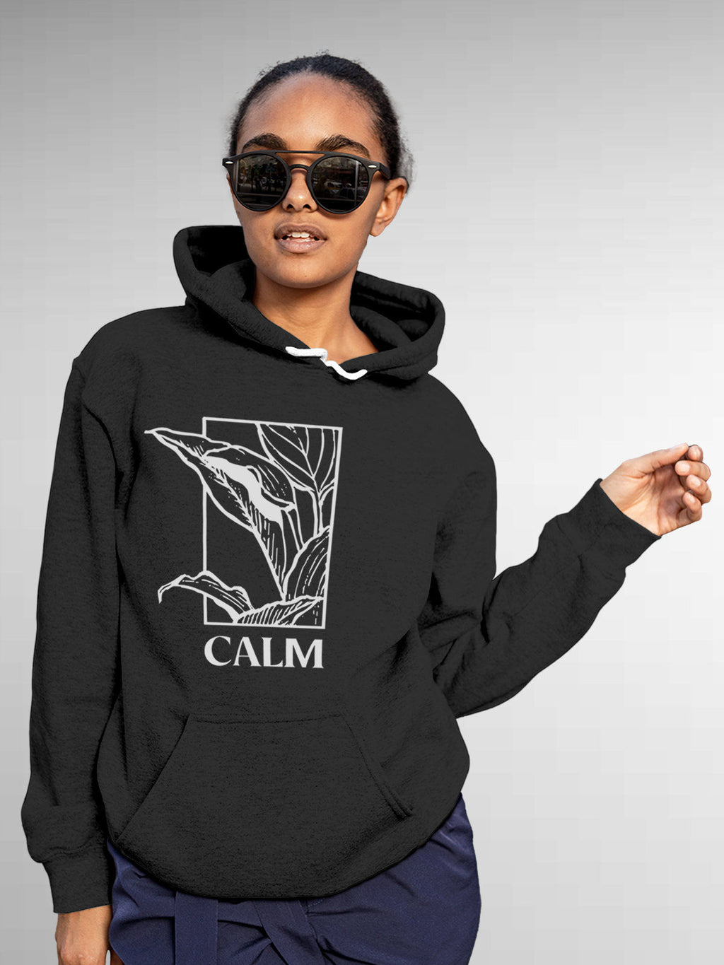 Model wearing Women's Dark Grey Hoodie Sweatshirt with 'Calm' design, offering effortless style and premium comfort
