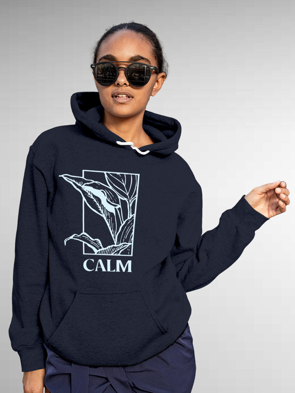 Model wearing Women's Navy Blue Hoodie Sweatshirt with 'Calm' design, offering effortless style and premium comfort