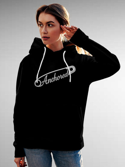 Model wearing Women's Black Hoodie Sweatshirt with 'Anchored' design, offering effortless style and premium comfort