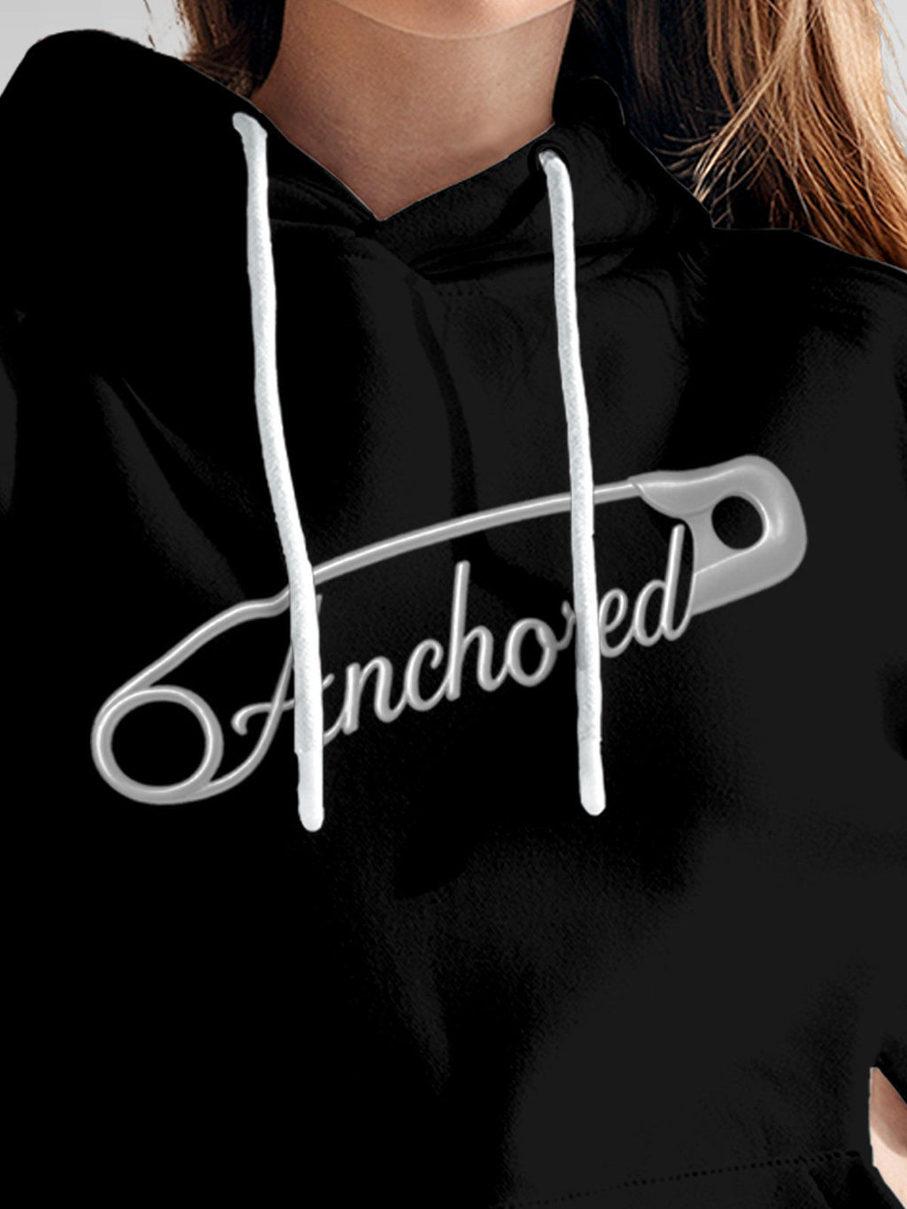 Close up of 'Anchored' design on Women's Black Hoodie Sweatshirt, highlighting intricate details and vibrant print.
