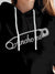 Close up of 'Anchored' design on Women's Black Hoodie Sweatshirt, highlighting intricate details and vibrant print.