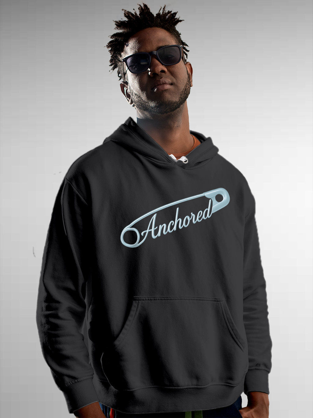 Model wearing Men's Dark Grey Hoodie Sweatshirt with 'Anchored' design, offering effortless style and premium comfort