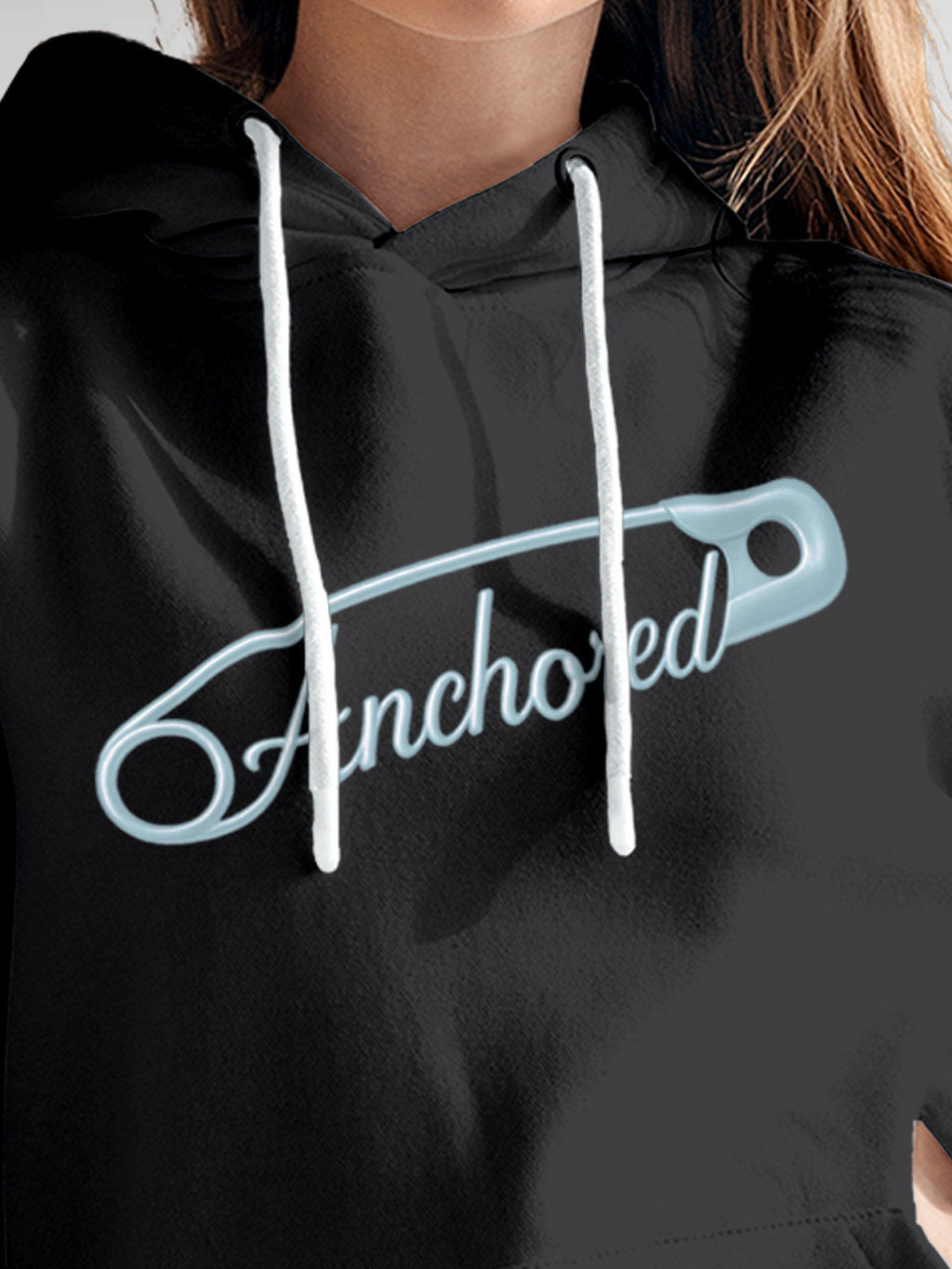 Close up of 'Anchored' design on Women's Dark Grey Hoodie Sweatshirt, highlighting intricate details and vibrant print.