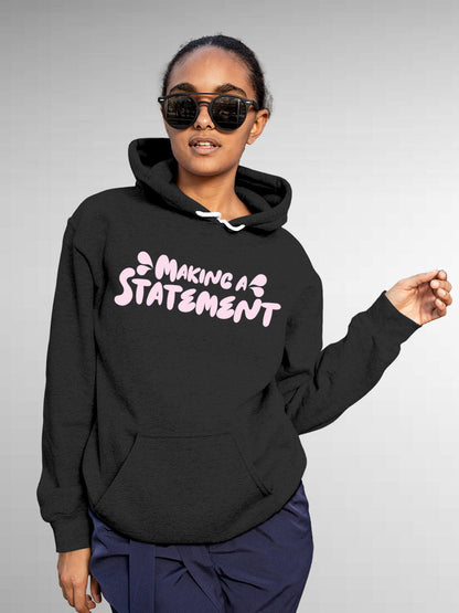 Model wearing Women's Dark Grey Hoodie Sweatshirt with 'Making A Statement' design, offering effortless style and premium comfort