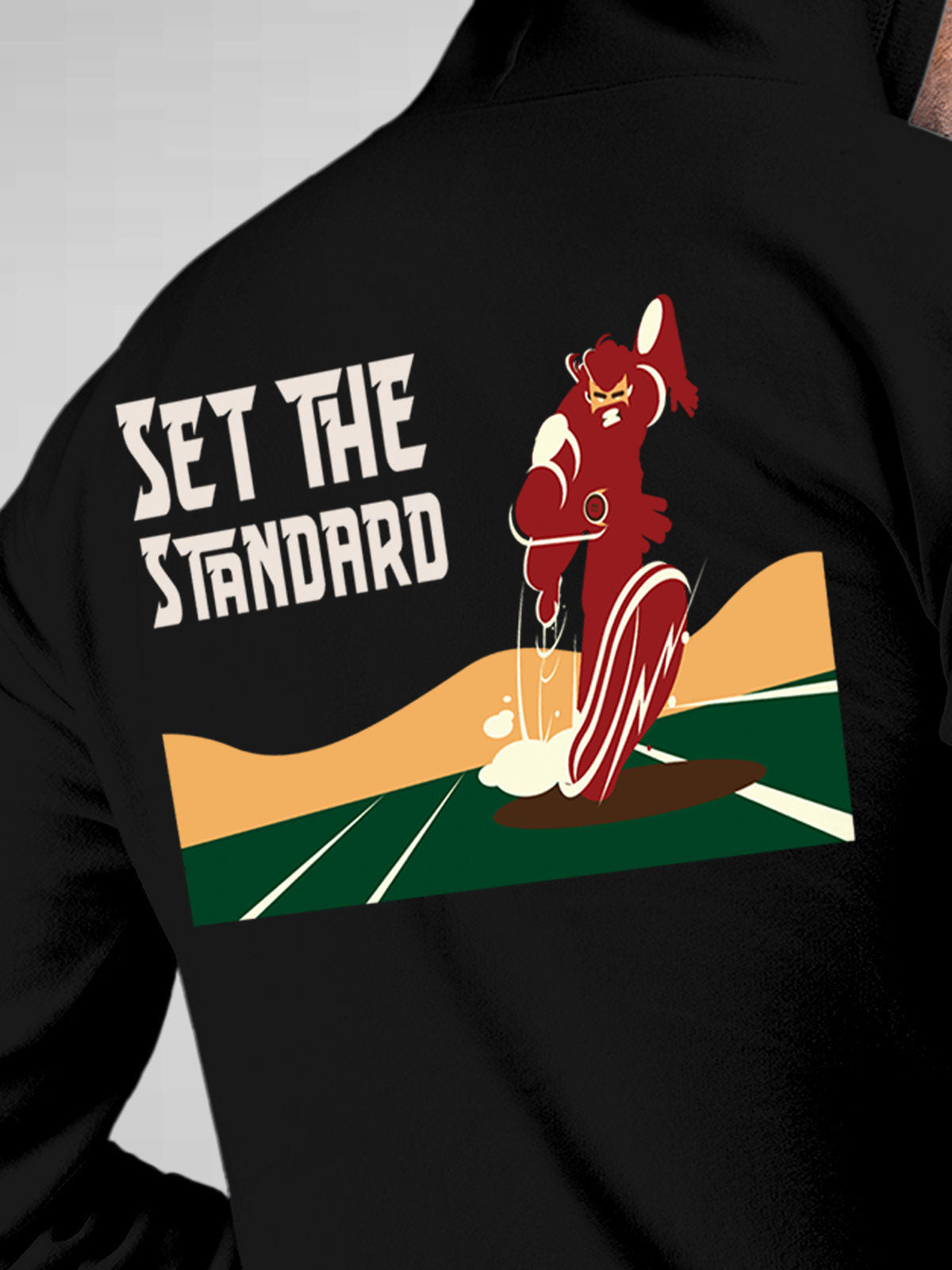 Close up of 'Raise The Bar' design on Men's Black Hoodie Sweatshirt, highlighting intricate details and vibrant print.