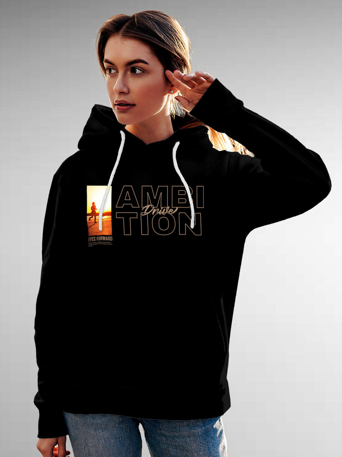 Model wearing Women's Black Hoodie Sweatshirt with 'Ambition & Drive' design, offering effortless style and premium comfort