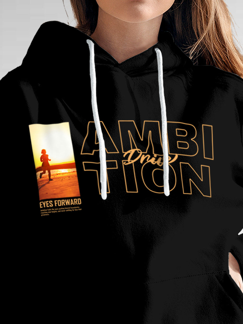 Close up of 'Ambition & Drive' design on Women's Black Hoodie Sweatshirt, highlighting intricate details and vibrant print.