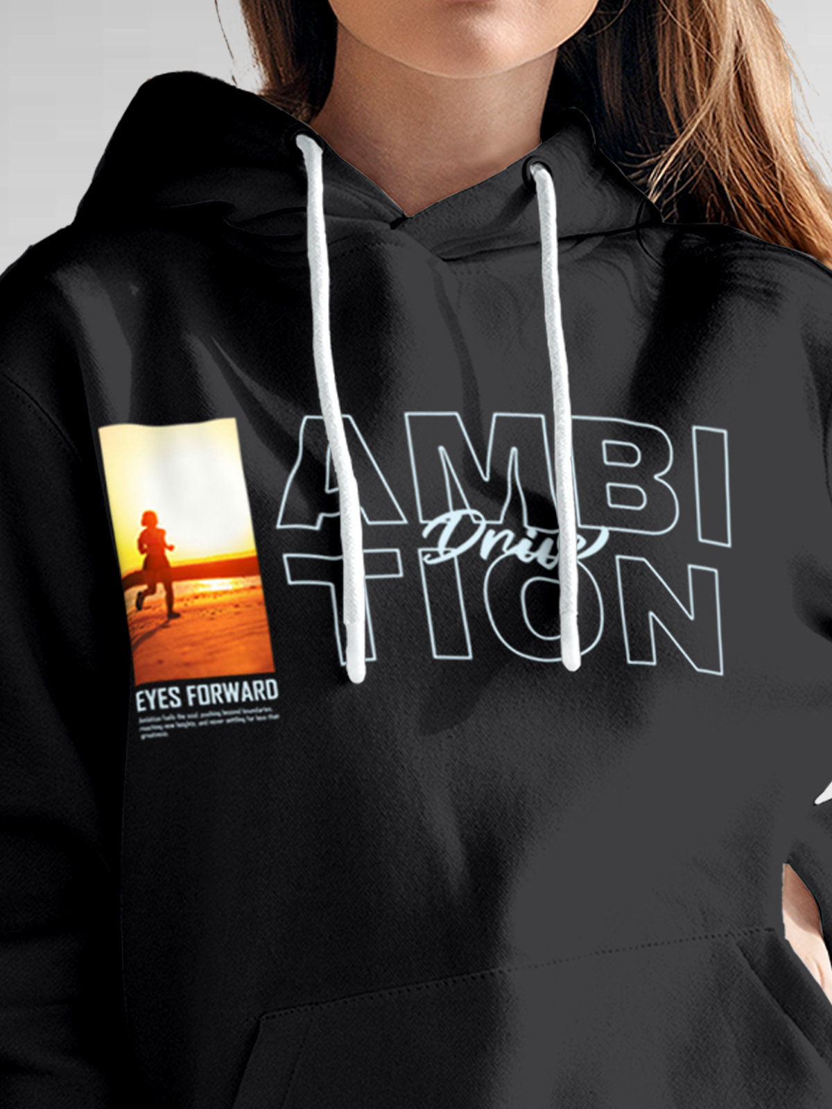 Close up of 'Ambition & Drive' design on Women's Dark Grey Hoodie Sweatshirt, highlighting intricate details and vibrant print.