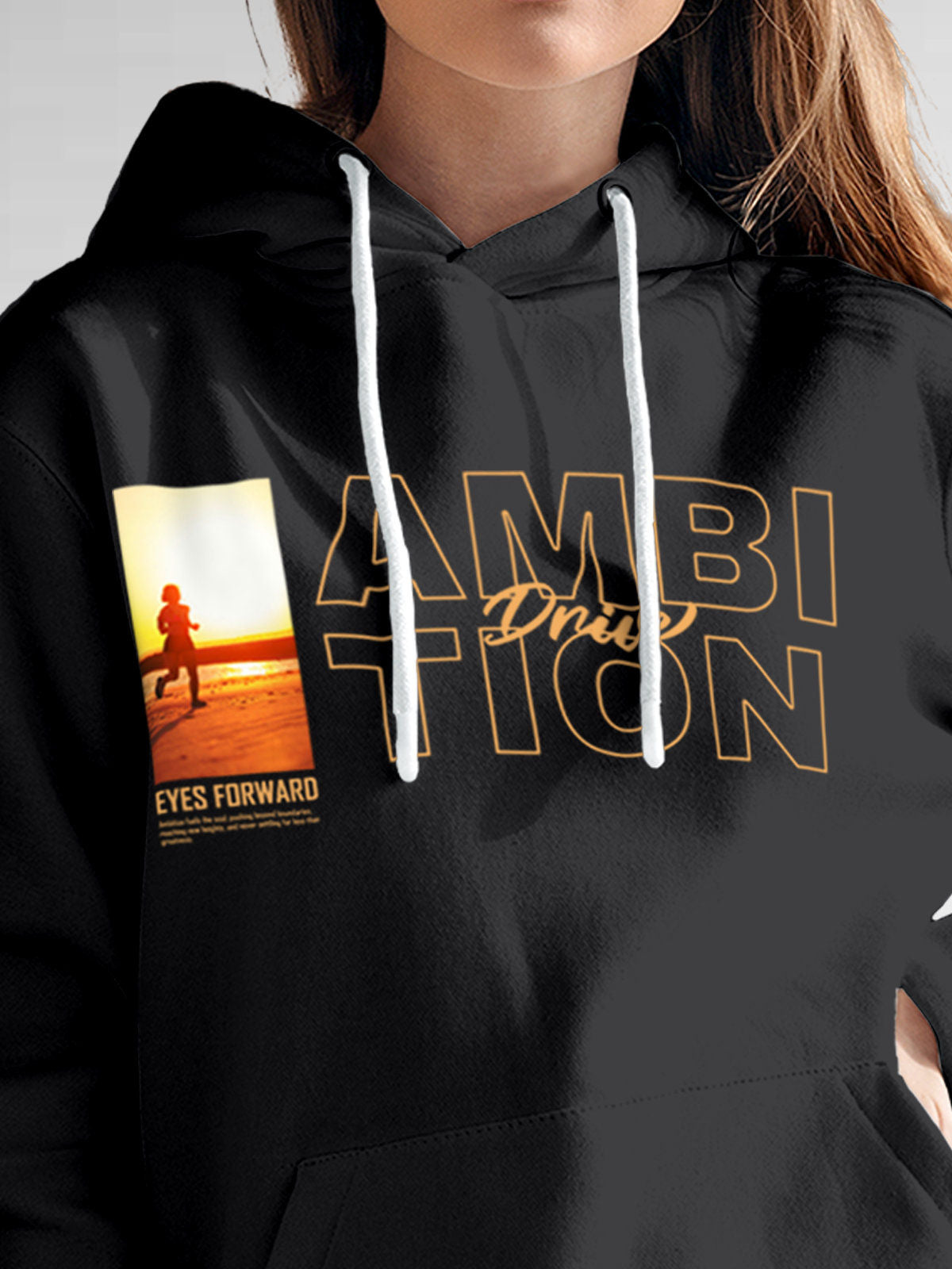 Close up of 'Ambition & Drive' design on Women's Dark Grey Hoodie Sweatshirt, highlighting intricate details and vibrant print.