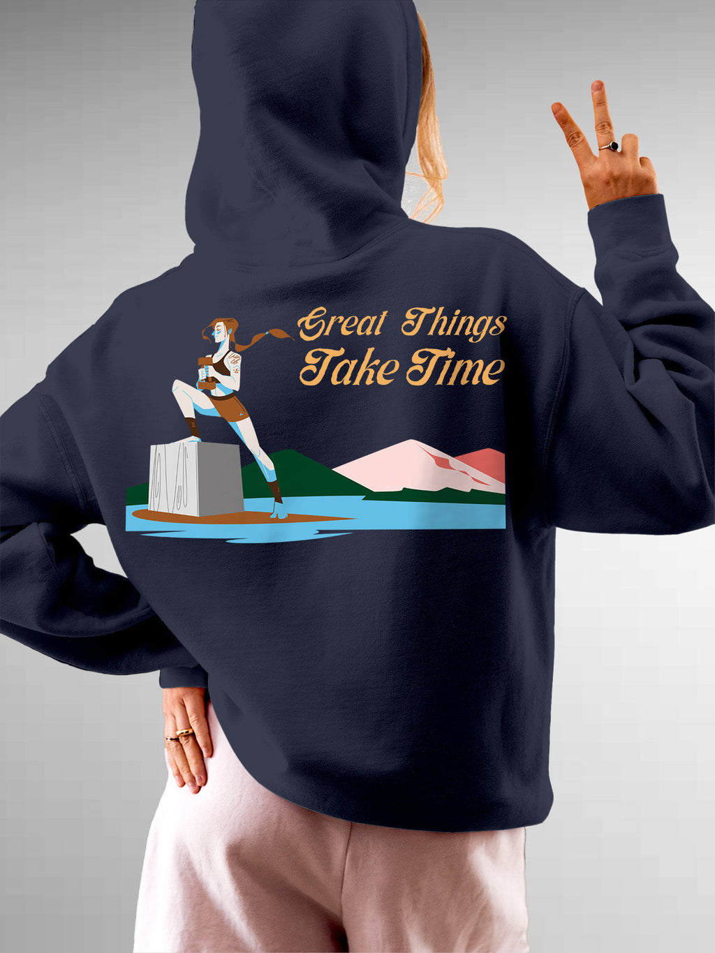 Model wearing Women's Navy Blue Hoodie Sweatshirt with 'Never Give Up' design, offering effortless style and premium comfort