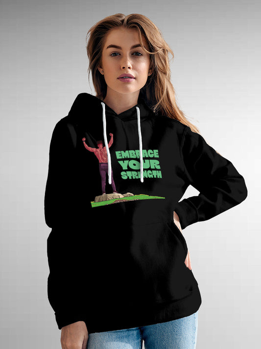 Model wearing Women's Black Hoodie Sweatshirt with 'Embrace Your Strength' design, offering effortless style and premium comfort