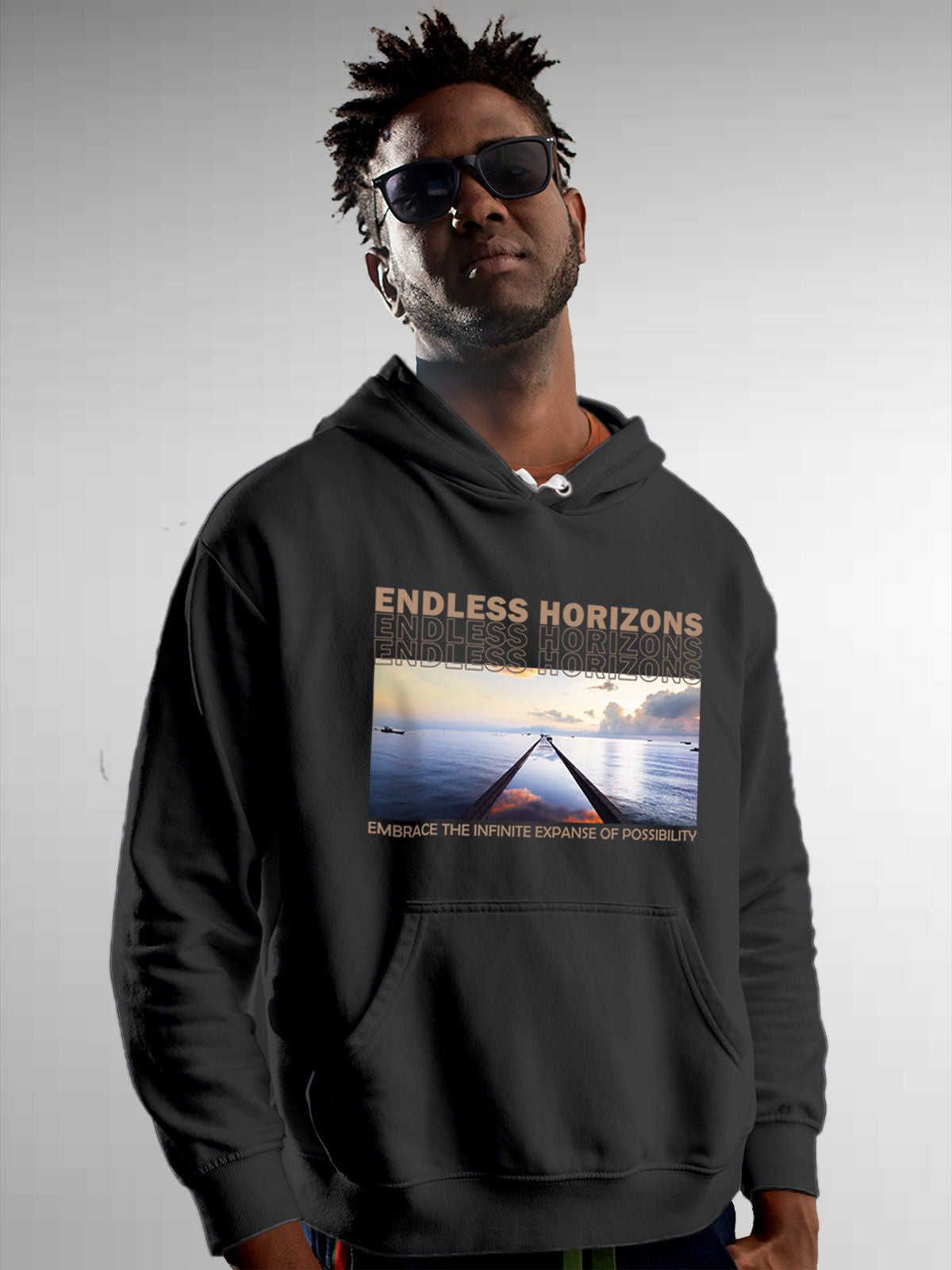 Model wearing Men's Dark Grey Hoodie Sweatshirt with 'Endless Horizons' design, offering effortless style and premium comfort