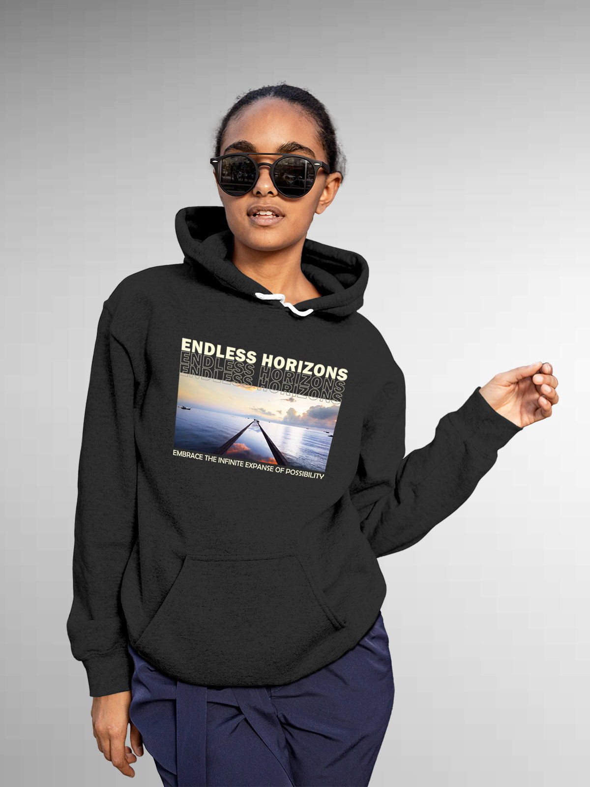 Model wearing Women's Dark Grey Hoodie Sweatshirt with 'Endless Horizons' design, offering effortless style and premium comfort