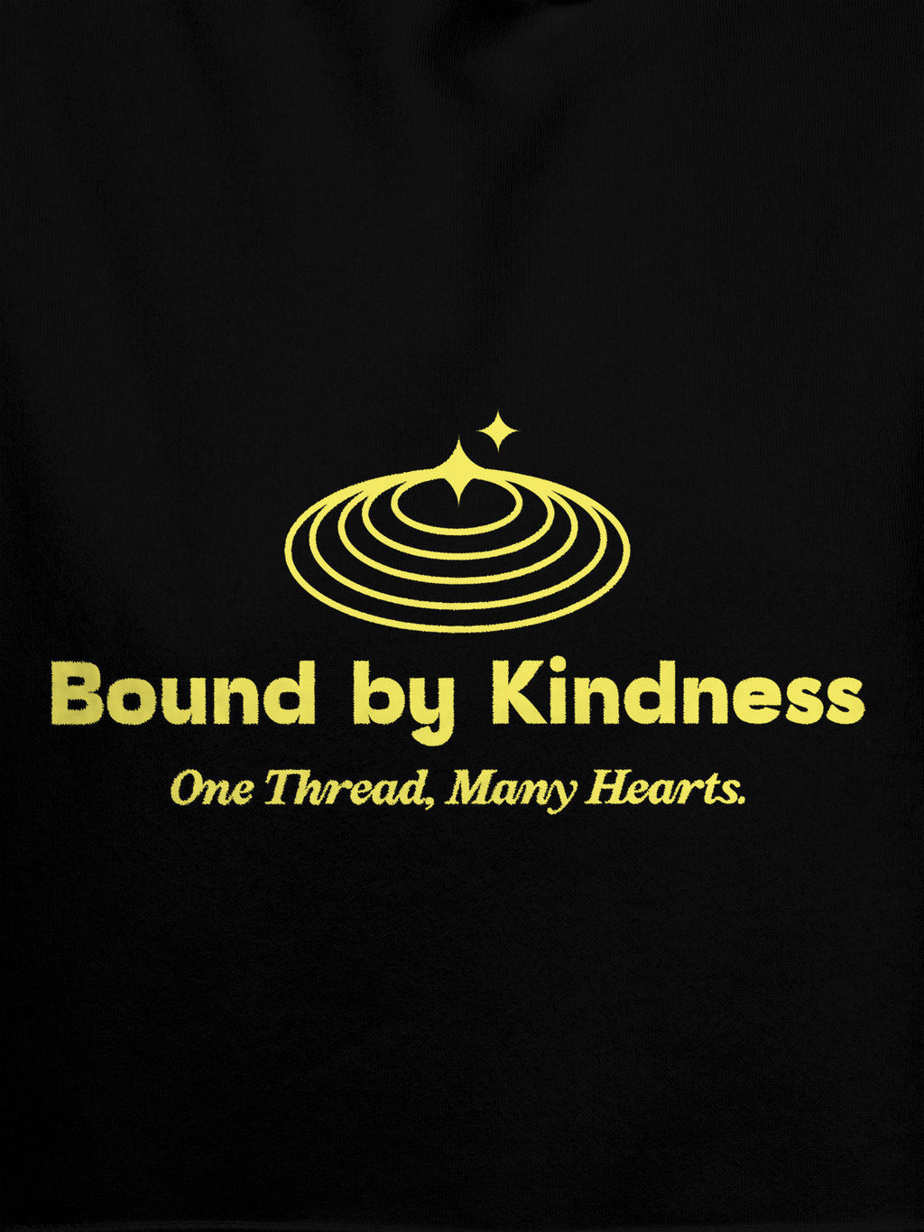 Close up of 'Bound By Kindness' design on Women's Black Hoodie Sweatshirt, highlighting intricate details and vibrant print.