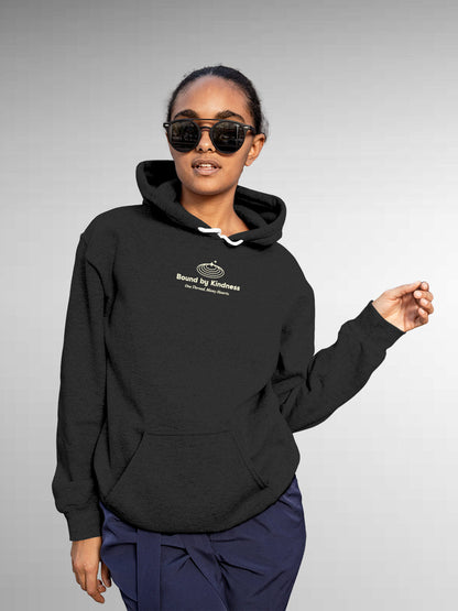 Model wearing Women's Dark Grey Hoodie Sweatshirt with 'Bound By Kindness' design, offering effortless style and premium comfort