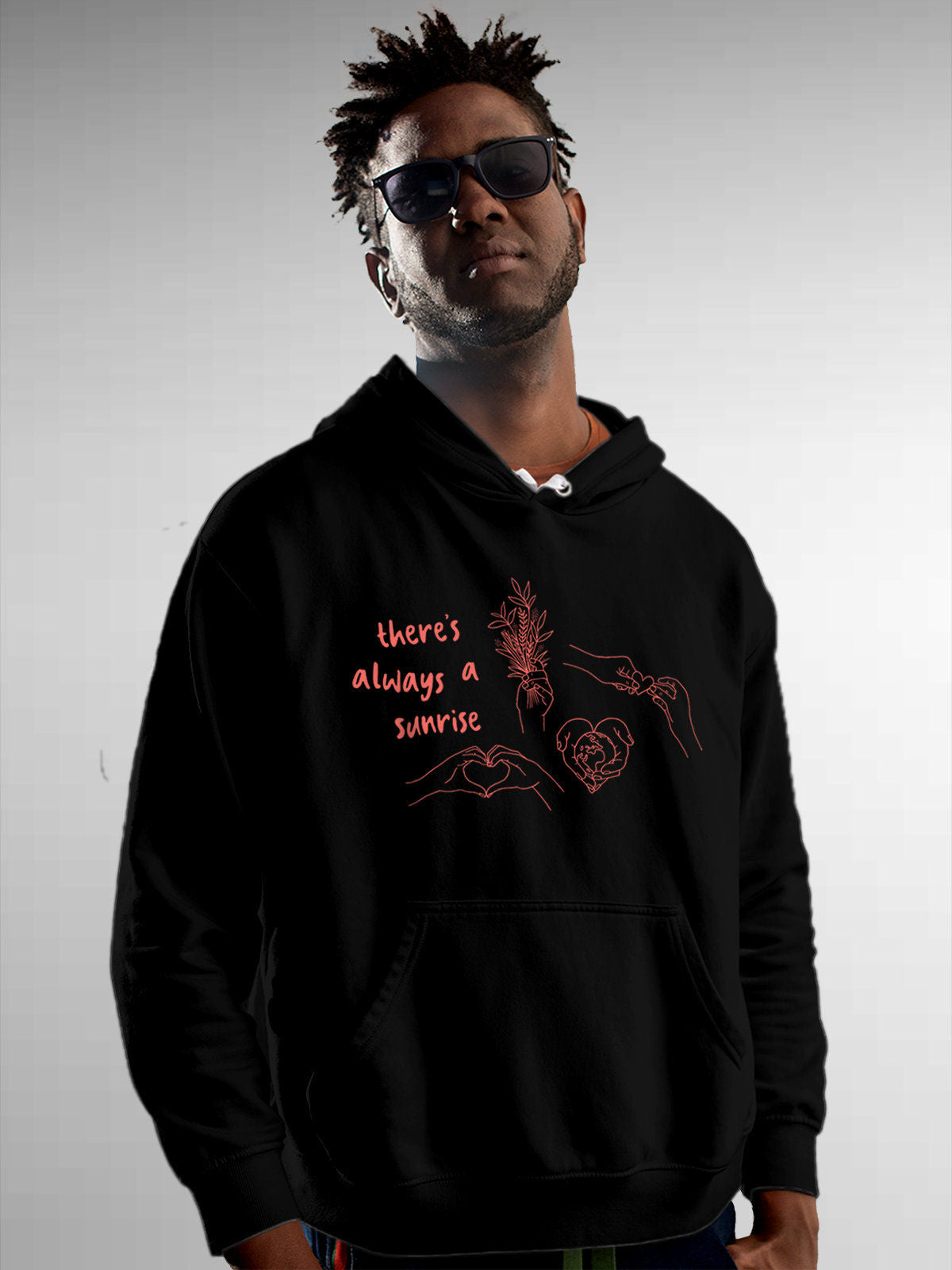 Model wearing Men's Black Hoodie Sweatshirt with 'There's Always a Sunrise' design, offering effortless style and premium comfort
