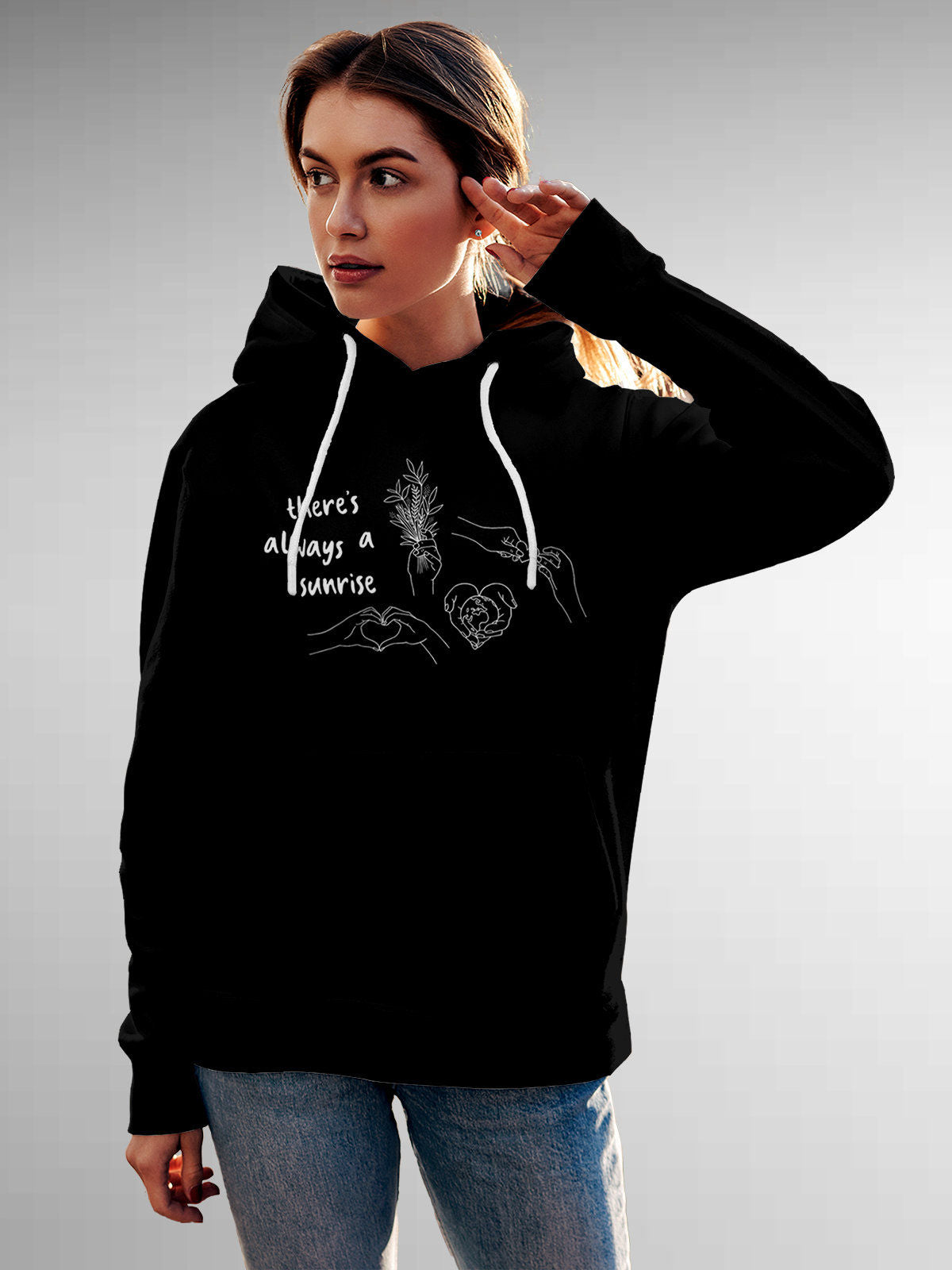 Model wearing Women's Black Hoodie Sweatshirt with 'There's Always a Sunrise' design, offering effortless style and premium comfort