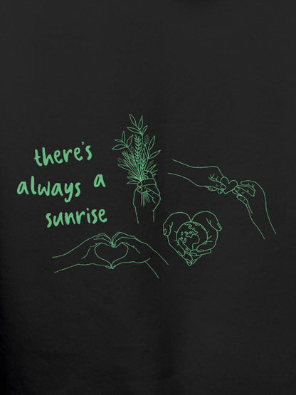 Close up of 'There's Always a Sunrise' design on Women's Dark Grey Hoodie Sweatshirt, highlighting intricate details and vibrant print.