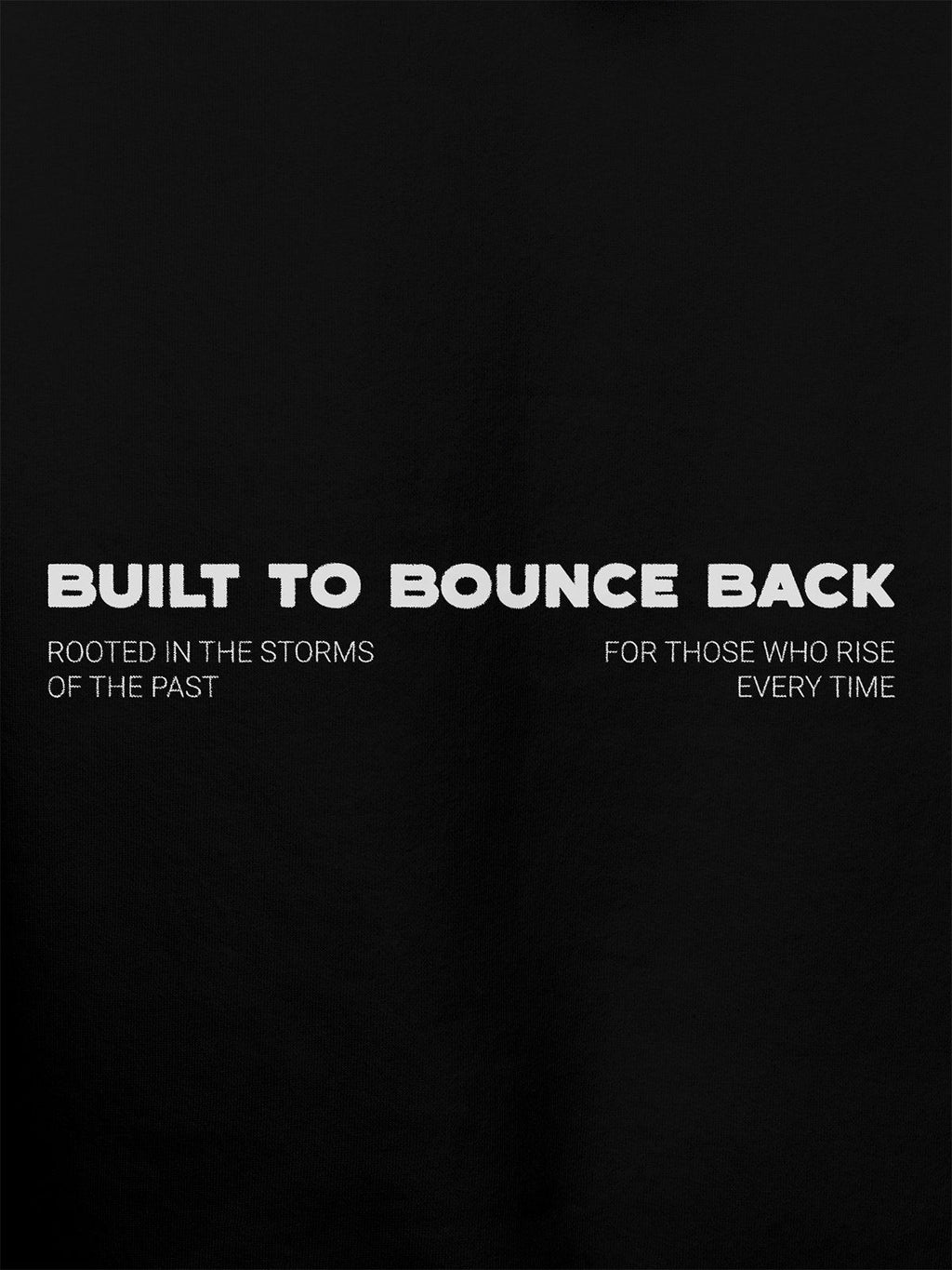 Close up of 'Built To Bounce Back' design on Women's Black Hoodie Sweatshirt, highlighting intricate details and vibrant print.