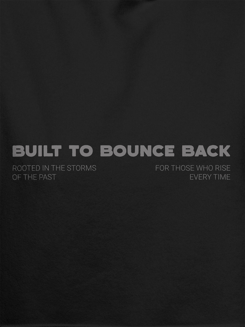 Close up of 'Built To Bounce Back' design on Men's Dark Grey Hoodie Sweatshirt, highlighting intricate details and vibrant print.