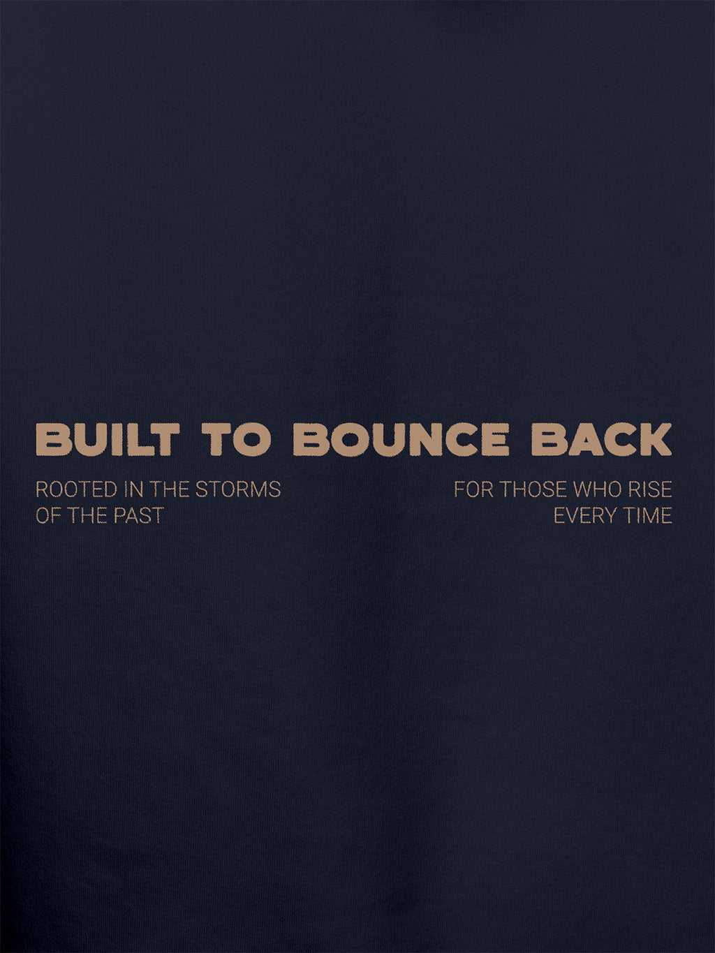 Close up of 'Built To Bounce Back' design on Women's Navy Blue Hoodie Sweatshirt, highlighting intricate details and vibrant print.