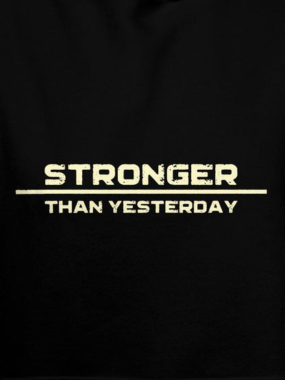 Close up of 'Stronger Than Yesterday' design on Men's Black Hoodie Sweatshirt, highlighting intricate details and vibrant print.