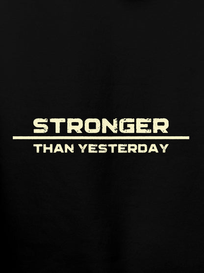 Close up of 'Stronger Than Yesterday' design on Women's Black Hoodie Sweatshirt, highlighting intricate details and vibrant print.