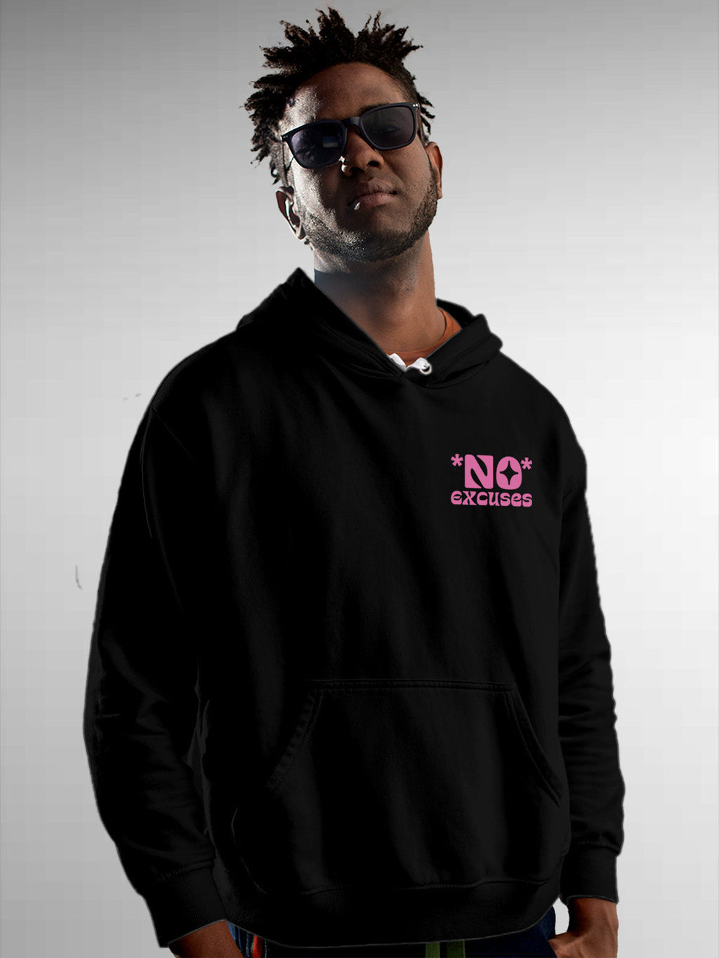 Model wearing Men's Black Hoodie Sweatshirt with 'No Excuses' design, offering effortless style and premium comfort