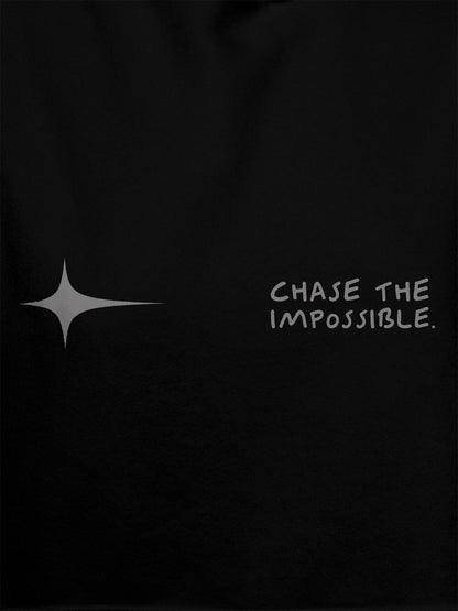 Close up of 'Chase The Impossible' design on Men's Black Hoodie Sweatshirt, highlighting intricate details and vibrant print.