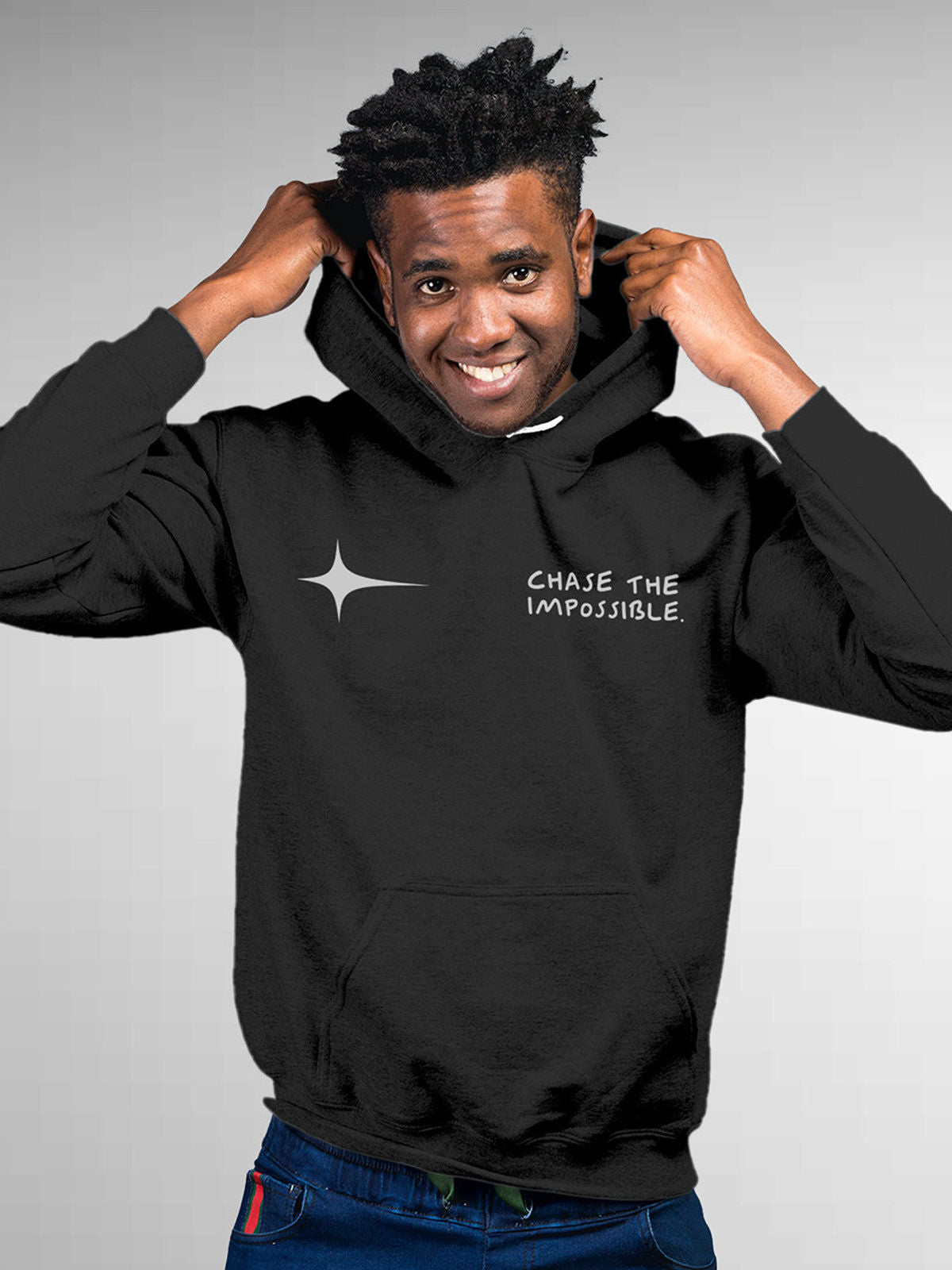 Model wearing Men's Dark Grey Hoodie Sweatshirt with 'Chase The Impossible' design, offering effortless style and premium comfort