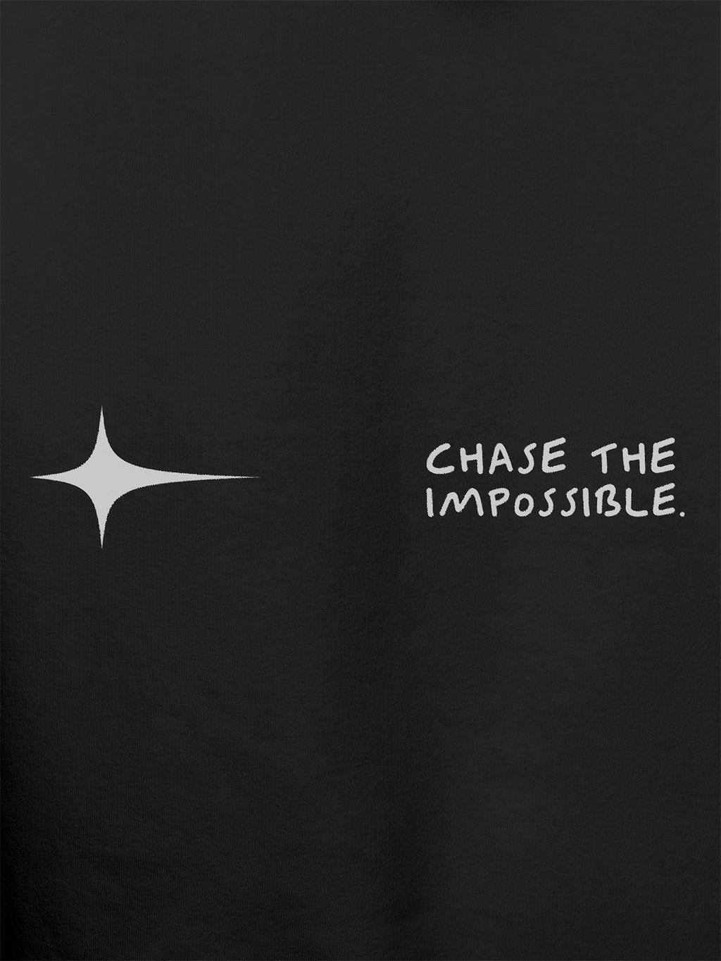 Close up of 'Chase The Impossible' design on Women's Dark Grey Hoodie Sweatshirt, highlighting intricate details and vibrant print.