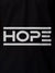 Close up of 'Hope' design on Men's Black Polo T-shirt, highlighting intricate details and vibrant print.