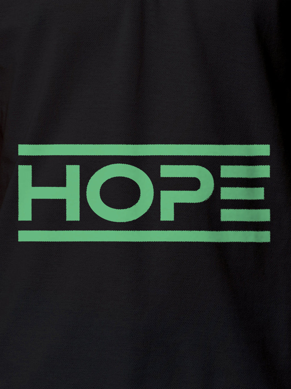 Close up of 'Hope' design on Men's Dark Grey Polo T-shirt, highlighting intricate details and vibrant print.