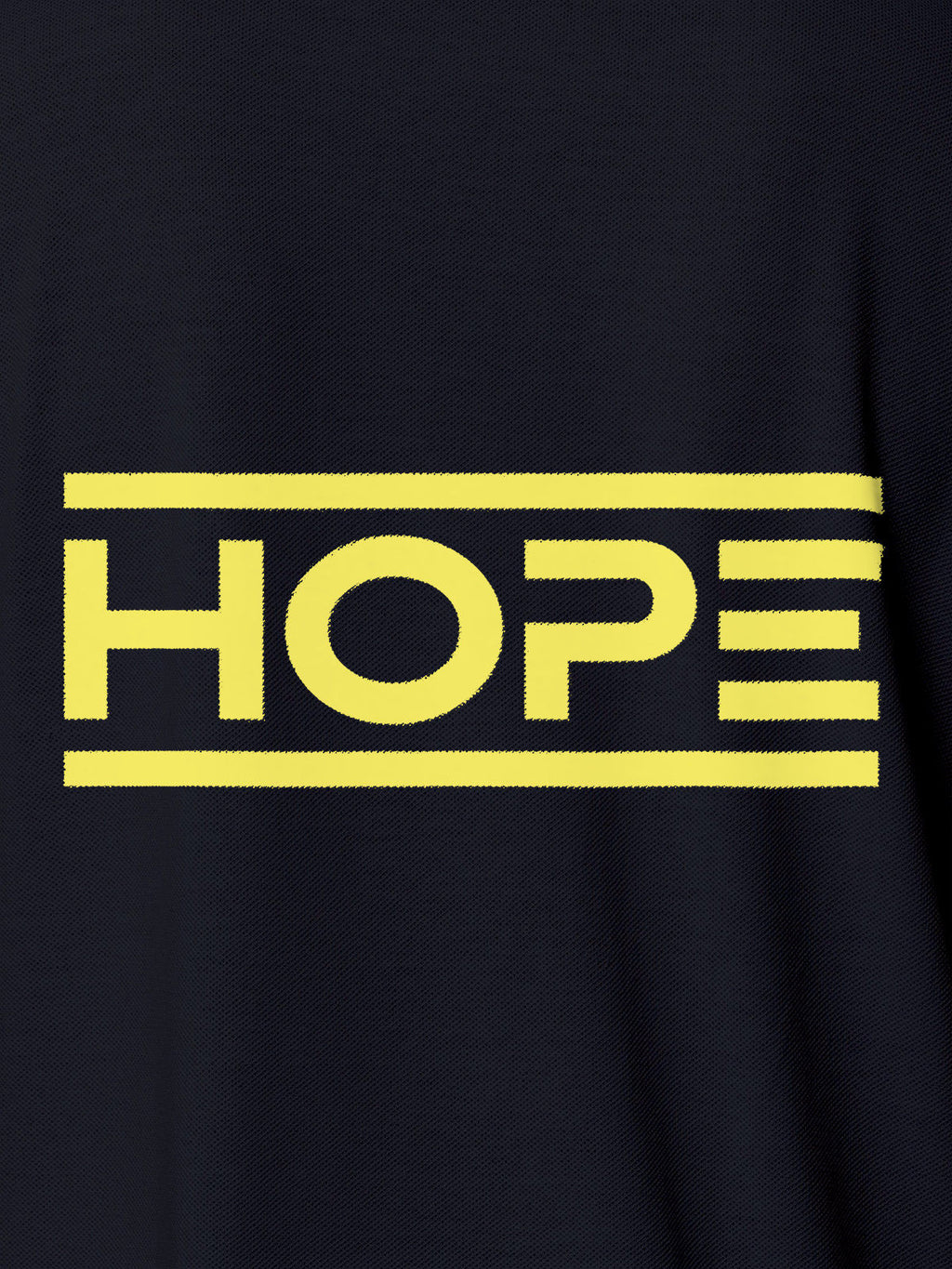 Close up of 'Hope' design on Women's Navy Blue Polo T-shirt, highlighting intricate details and vibrant print.