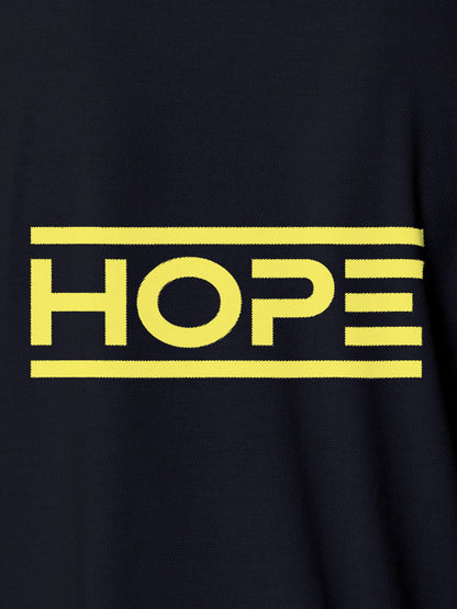 Close up of 'Hope' design on Women's Navy Blue Polo T-shirt, highlighting intricate details and vibrant print.