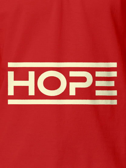 Close up of 'Hope' design on Men's Red Polo T-shirt, highlighting intricate details and vibrant print.