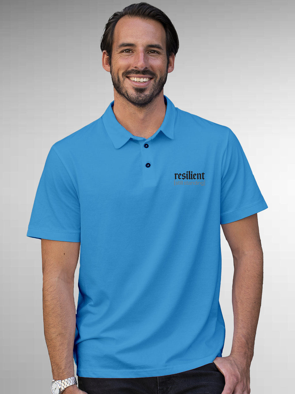 Model wearing Men's Blue Polo T-shirt with 'Resilient' design, offering effortless style and premium comfort