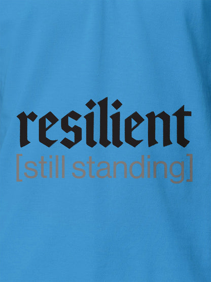 Close up of 'Resilient' design on Women's Blue Polo T-shirt, highlighting intricate details and vibrant print.