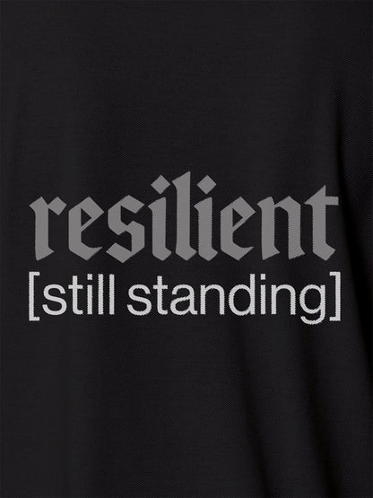 Close up of 'Resilient' design on Men's Dark Grey Polo T-shirt, highlighting intricate details and vibrant print.